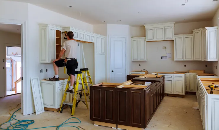 Kitchen remodeling in Los Angeles with custom cabinet installation, island construction, and premium renovation work in progress