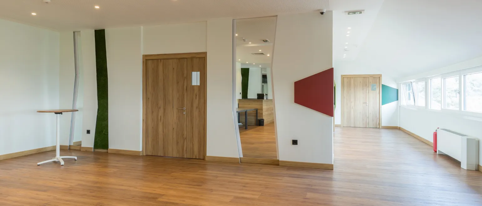 After HOA remodeling services project in Los Angeles with upgraded common area interior, modern flooring, clean wall finishes, brighter lighting, and improved shared residential space