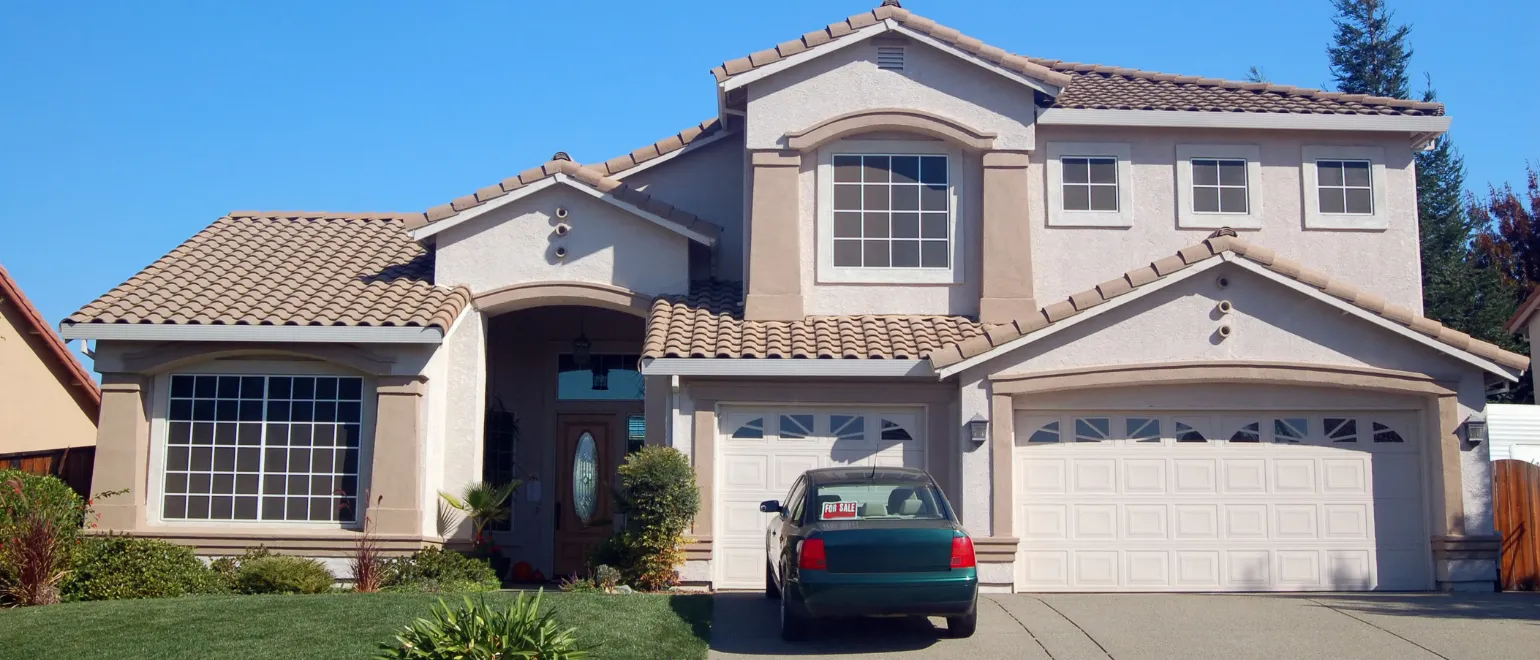 After room additions project in Los Angeles with two-story home expansion, upgraded exterior design, added living space, and improved residential property value